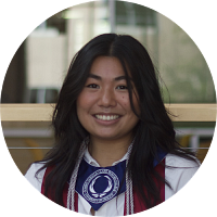 circular portrait of grace miyoshi in grad gown and honors college stole