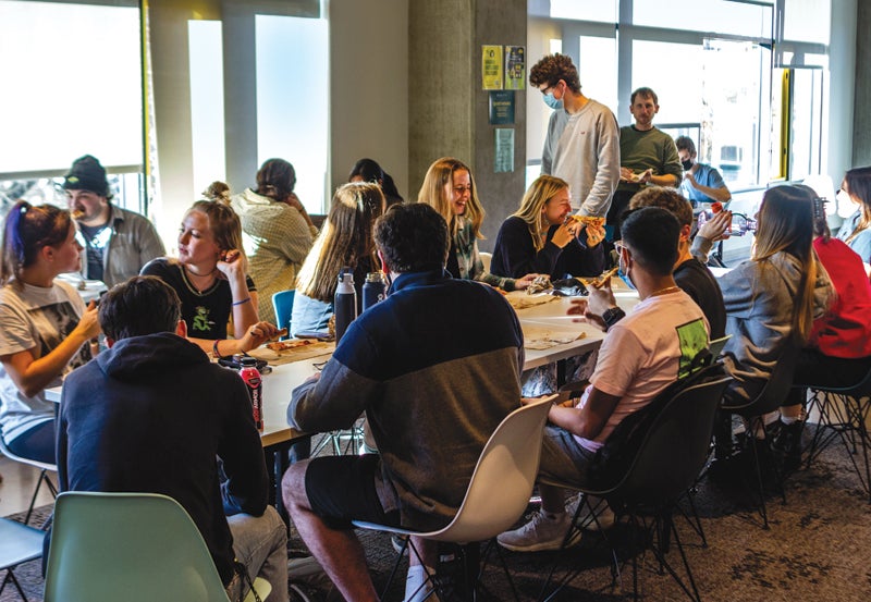 Residents dining together at table
