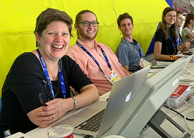 Lori Shontz and students reporting on the World Athletics Championships in Doha, Qatar