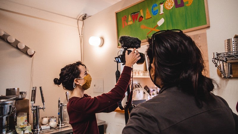 Monica Salazar and Pierce Singgih capture footage for Salazar's story without words project.