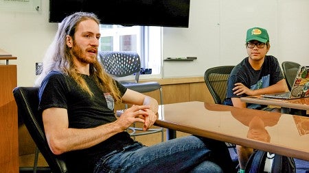 Bart Brewer talks in class