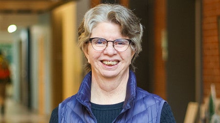 portrait of Gabriela Martinez in the atrium of Allen Hall