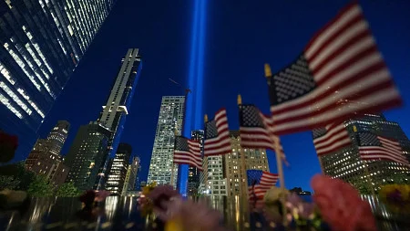 Stock image of two beams of light emanating from the site of the World Trade Center towers in New York City