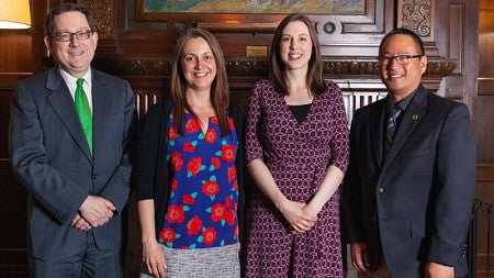 From left: UO President Michael Schill, Jessica Matthiesen, Rachel Allen and Gene Sandan. 