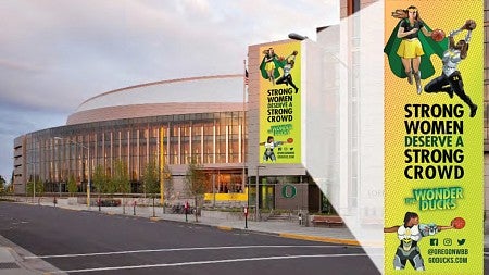 University of Oregon School of Journalism and Communication Allen Hall PR student work outside Matthew Knight Arena 