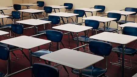 Classroom filled with empty desks