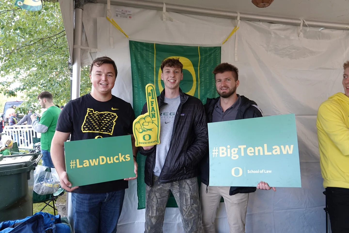 Students holding oregon law signs