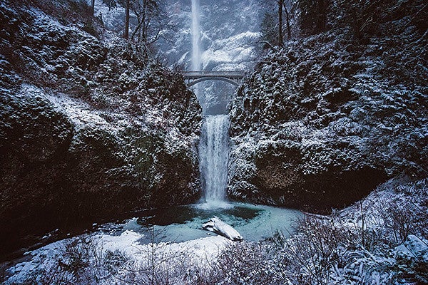 Multnomah Falls covered in light snow