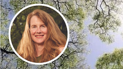 Photo of Professor Mary Wood against a background of trees