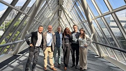  The ELPP team—including Professor Dotson; ENR Research Associate Doug Quirke; and ENR Fellows Chelsea Dobbin, Lexi Hernandez, and Brenton Riddle—are pictured with Data Center Advisory Committee Co-Chair Michael Jung at the World Trade Center in Portland, Oregon. 