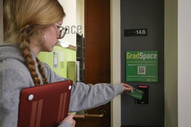 Student accessing the GradSpace using a card reader.