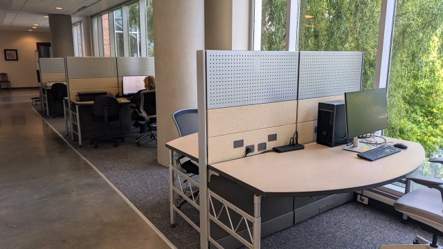 Computer workstation with monitor, keyboard, and mouse