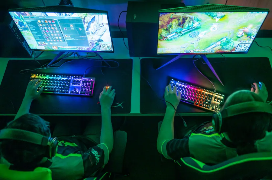 overhead view of two people on gaming computers