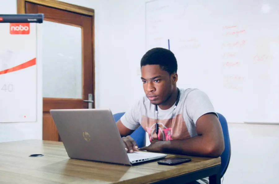Student working on a laptop.