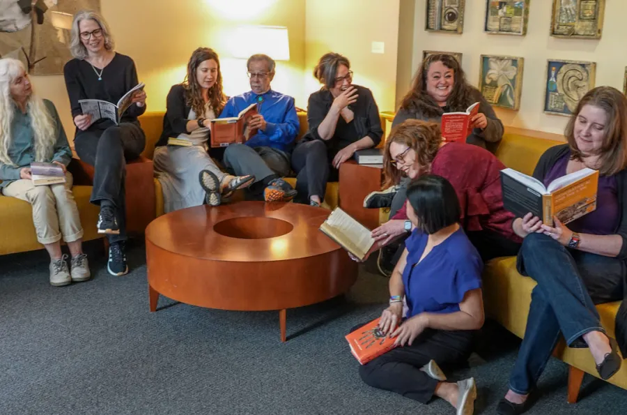 Group of people sitting in lounge.