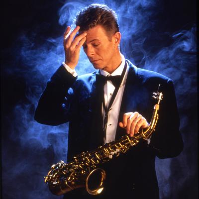 David Bowie with saxophone and cigarette