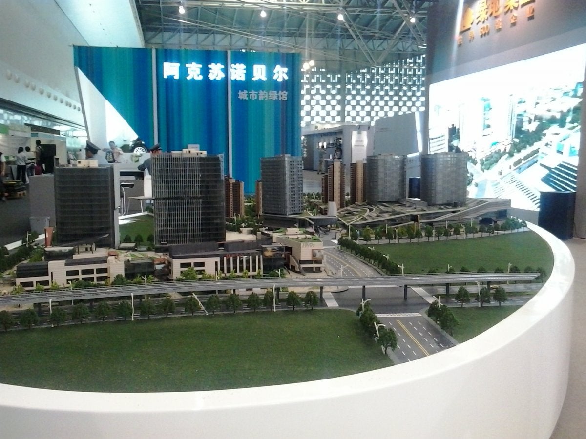 An image of Xian Dai's booth at the 2013 Green Building Technology Week (photo courtesy of Center of Asian and Pacific Studies)