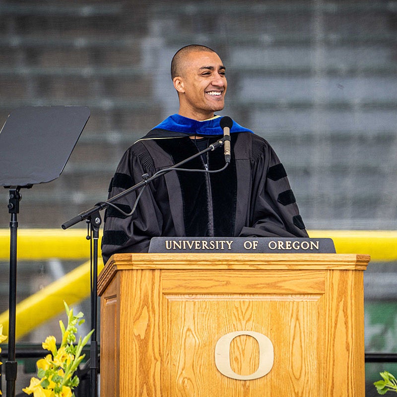 Keynote speaker Ashton Eaton, class of 2010, speaking at the UO 2022 Graduation