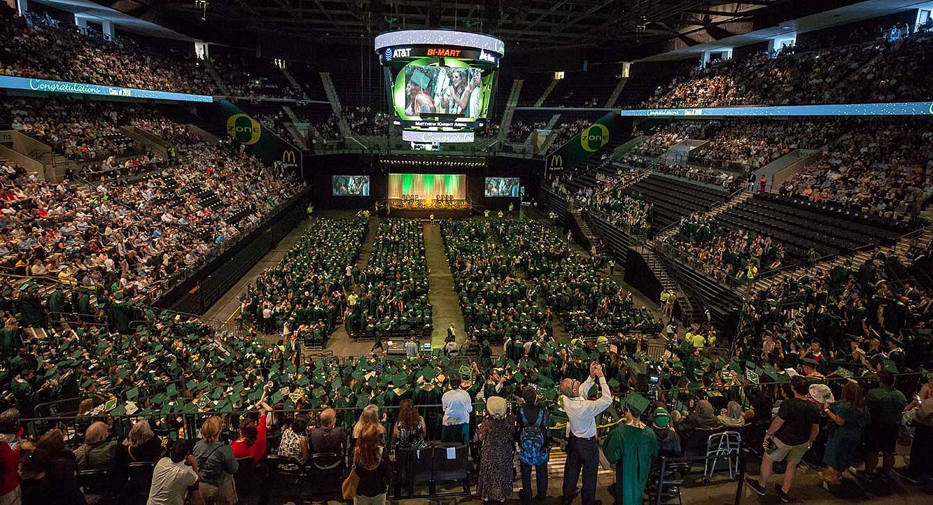 Graduates and families fill the seats of Matt Knight Arena