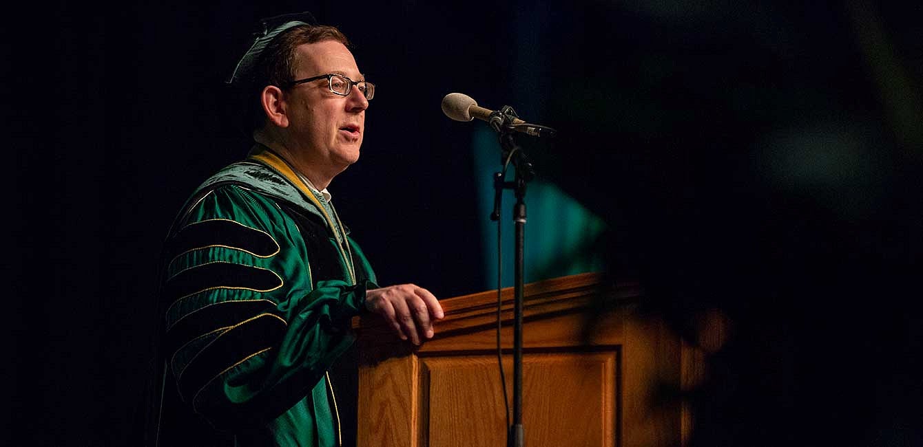 President Schill introduced commencement speakers, gave Carrie Wiems and Lorry Lokey honorary degrees for their contributions to society, and congratulated the newly graduated students