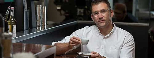 Chris Hendon with a cup of coffee