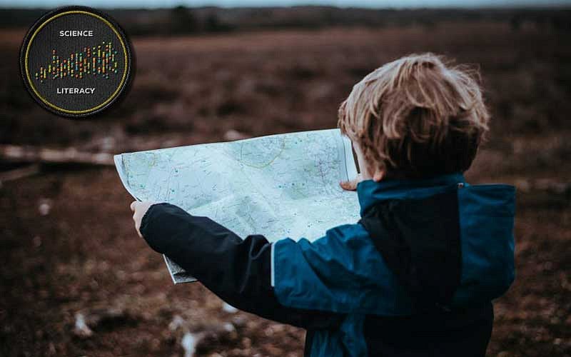 Child looking at map
