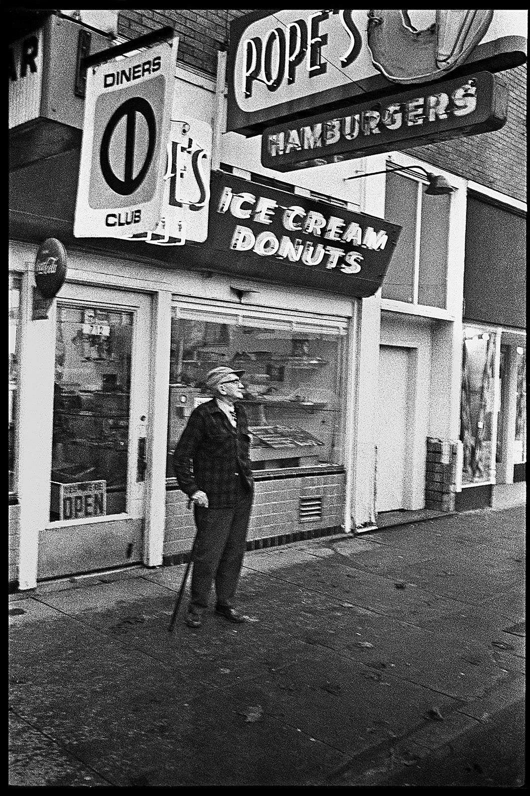 Exterior neon signage for Pope's before stricter sign codes came into existence. Photograph by John Bauguess
