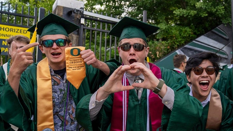 excited grad men