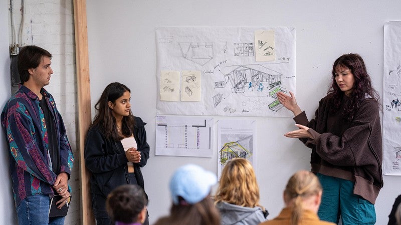 Students giving a design presentation during the Bruton Design Intensive