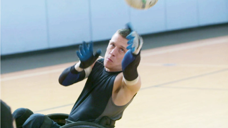 Seth McBride passes the ball during a Portland Pounders wheelchair rugby practice