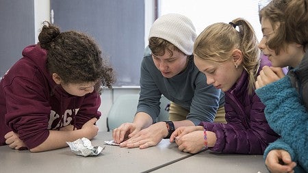 Lisa Eytel, with young science students