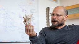 Andrew Kern holding artifact