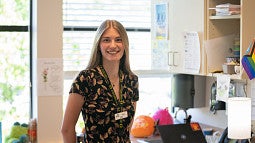 Young woman smiling in a healthcare clinic