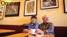 Donna and George McGuinness at the Metropol Bakery, with a portion of their collection on display behind them. Photograph by David Loveall