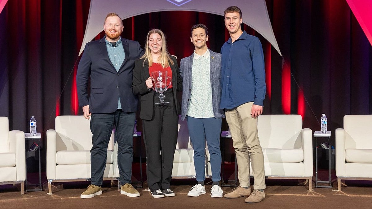 Warsaw students accepting award
