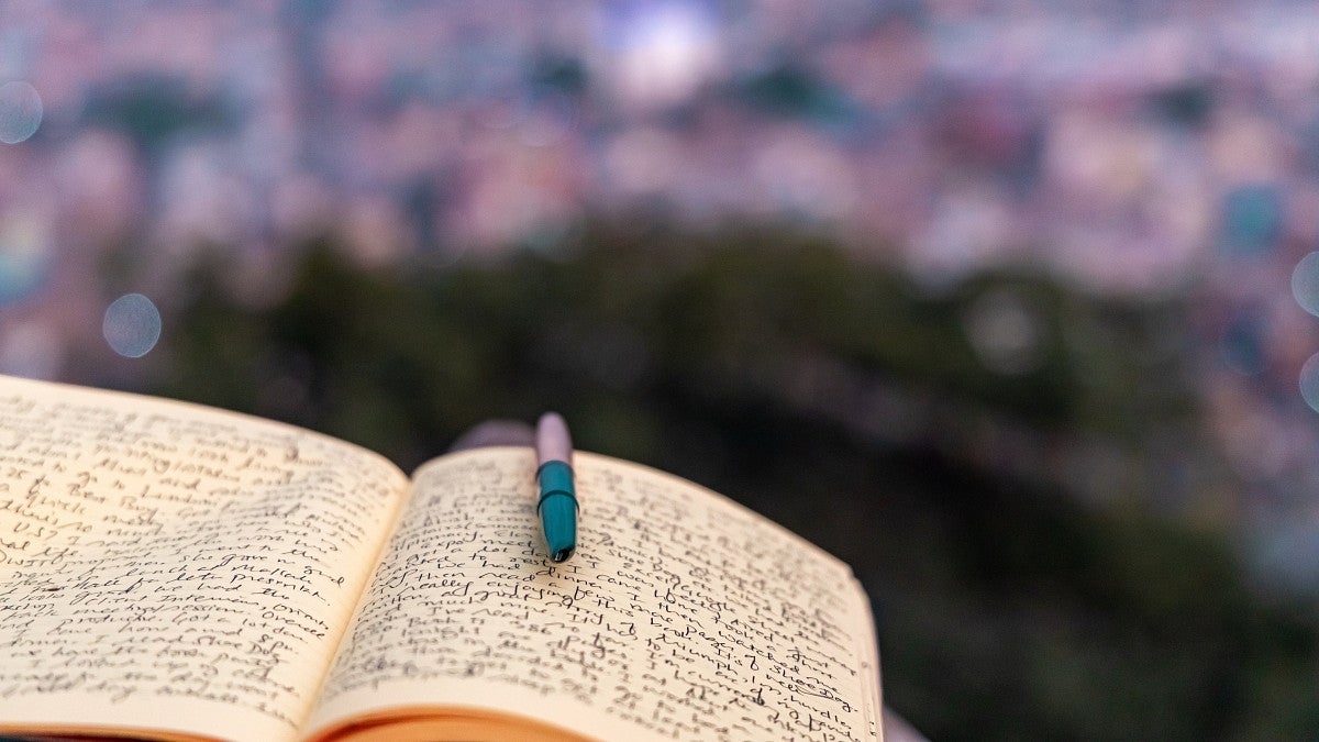 journaling book with pen