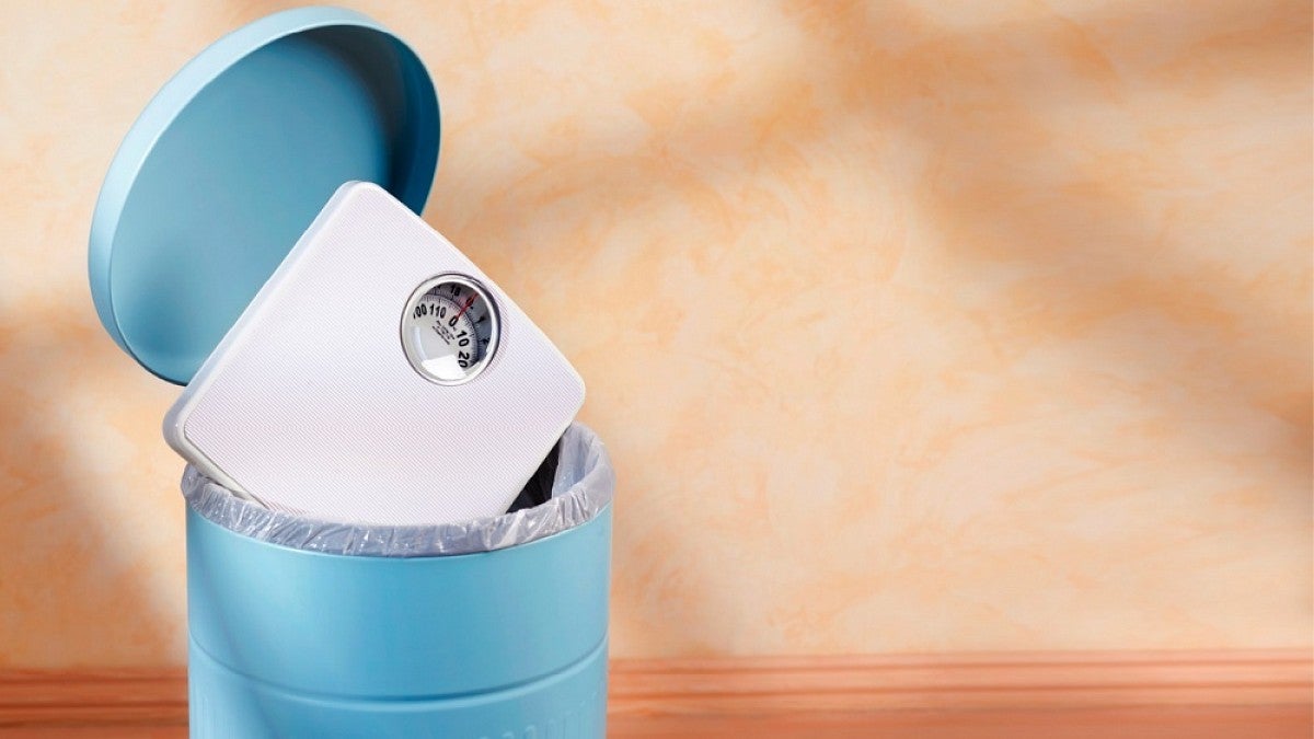 Bathroom scale in trash can