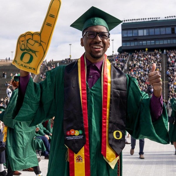 grad man with foam finger