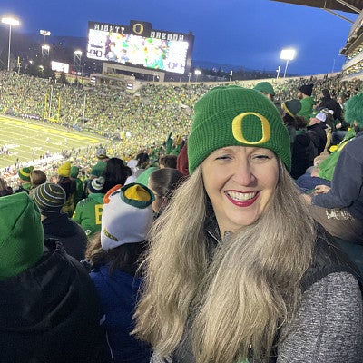Duck fan in the stands at a football game