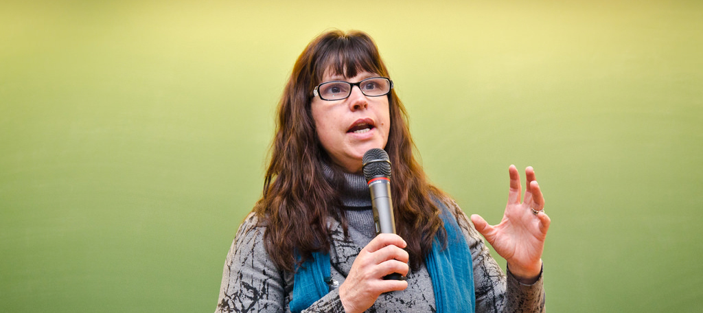 Photograph of Kari Norgaard giving a lecture