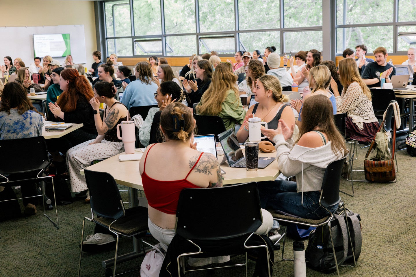 alison schmitke's classroom celebrating faculty member's award announcement