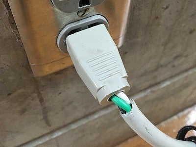 Broken electrical cord plug head