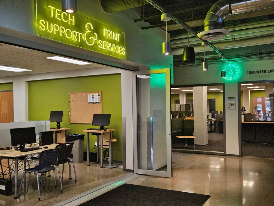 Wide view of the Technology Support Desk and EMU Computer Lab.
