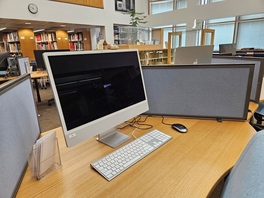 Close view of a computer lab station within the Lawrence Room 200 Design Library computer lab.