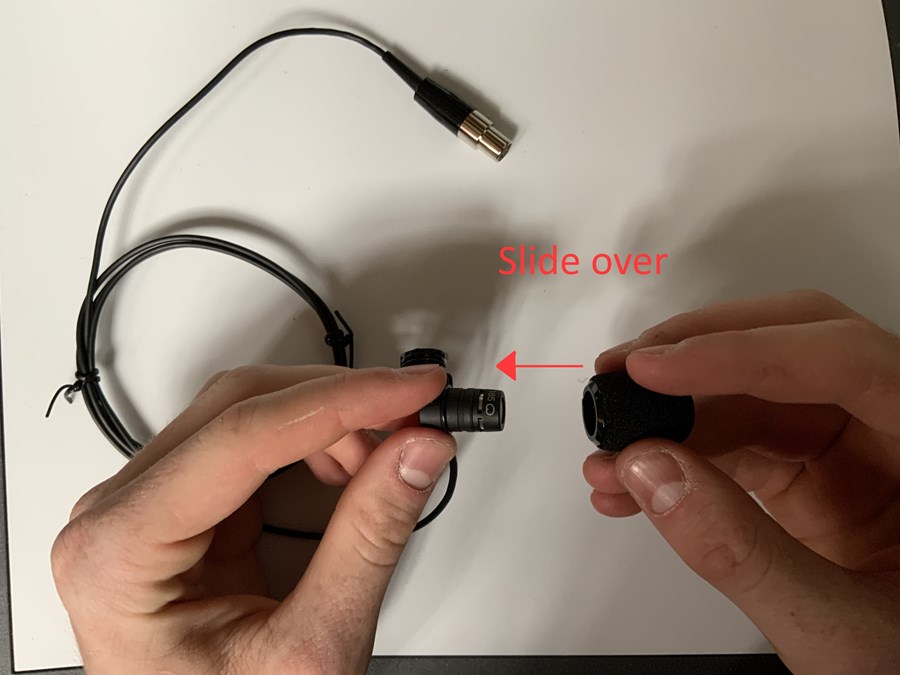 Install the pop filter over the mic unit