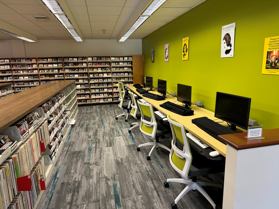 Douglass Room computers on the right and bookshelves on the left