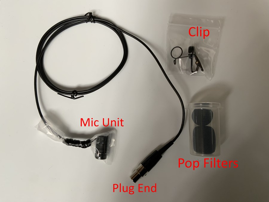 Initial setup with labeled parts: mic unit, pop filters, clips, and plug end