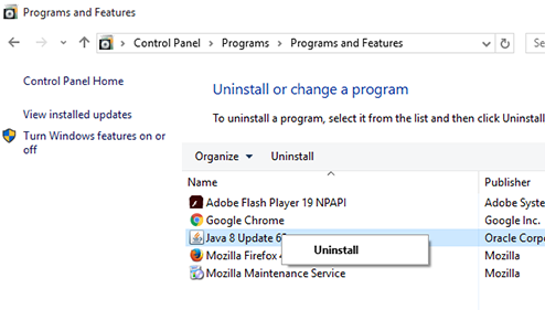 Uninstall or change a program window with Java highlighted with Uninstall option visible.