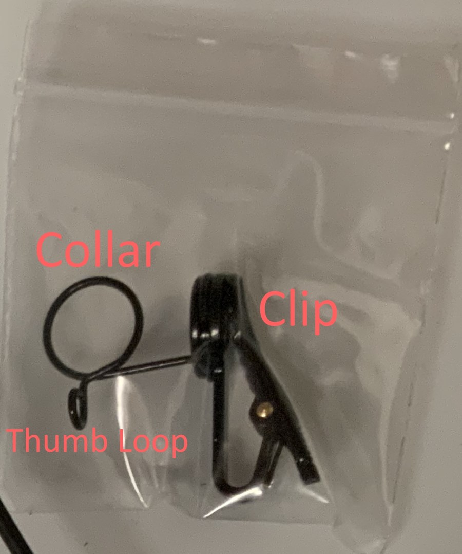 The mic clip with the collar, clip, and thumb loop labeled