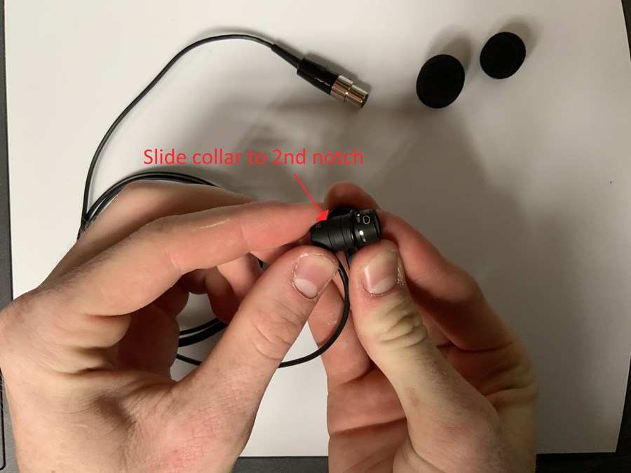 Slide the collar down to the second notch of the mic unit